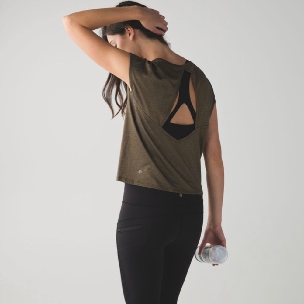 Lululemon top with shimmery gold, back cut out and cap sleeves